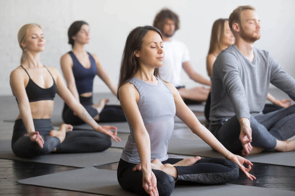 yoga class in modular fitness building