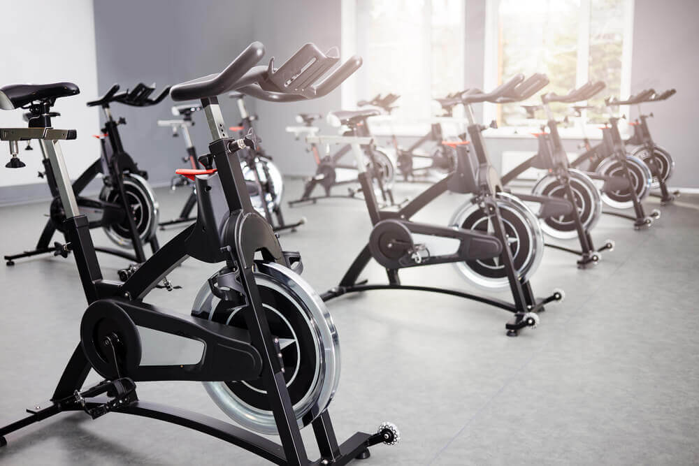 spin class set up in modular fitness building