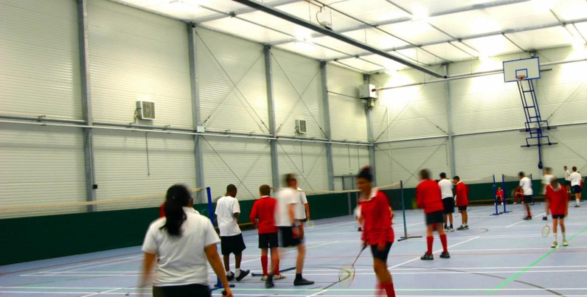 Children playing in temporary sports hall